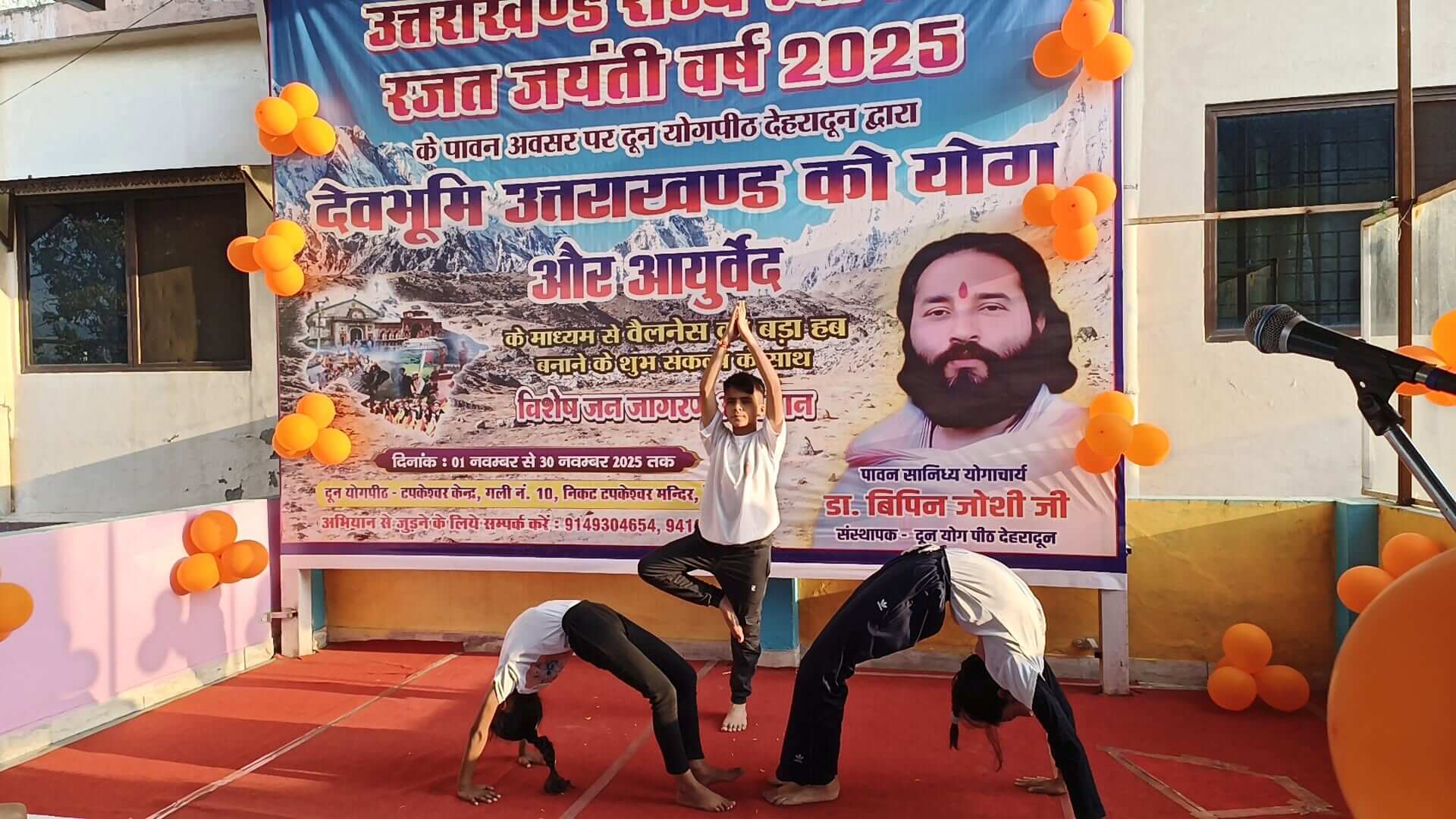 Trainer guiding an asana adjustment